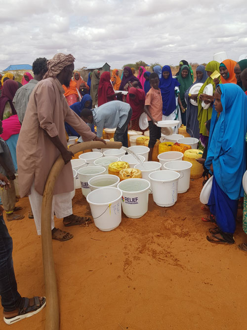 Water distribution in a drought-affected village in Somalia.