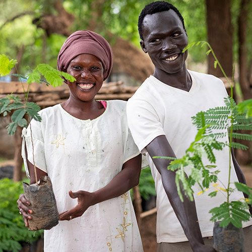 Faida Abtosh and Maneno Ahmed work at the Gentil Tree Nursery in Maban, South Sudan. Elie Gardner/RI