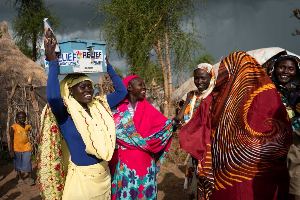 Women from a Village Savings and Loan Association, Batil refugee camp, South Sudan.