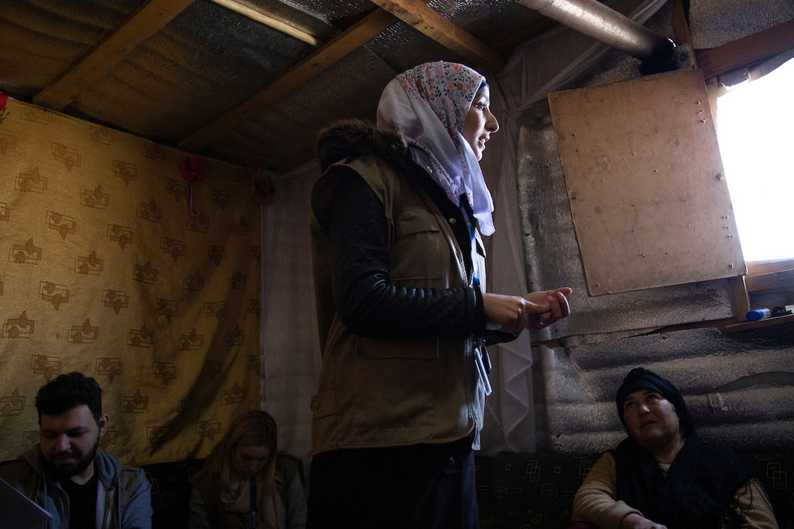 Iman speaks to members of her community at a mental health awareness session organized by Relief International. Elie Gardner/RI