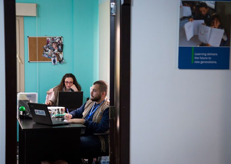 Giselle Hamzo and Georges Kassouf, both Cash for Education Field Assistants, photographed at Relief International's Bekaa office in Lebanon. Elie Gardner/RI