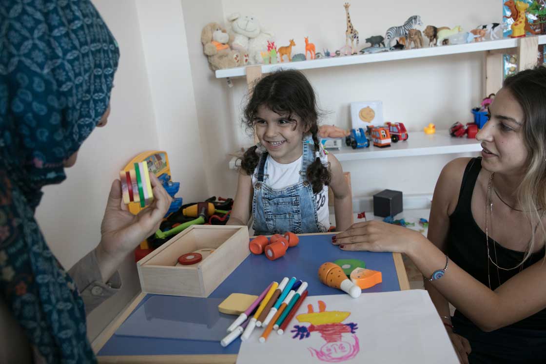 A child enjoying art therapy at one of our centers in Istanbul. Rachel Elkind/RI