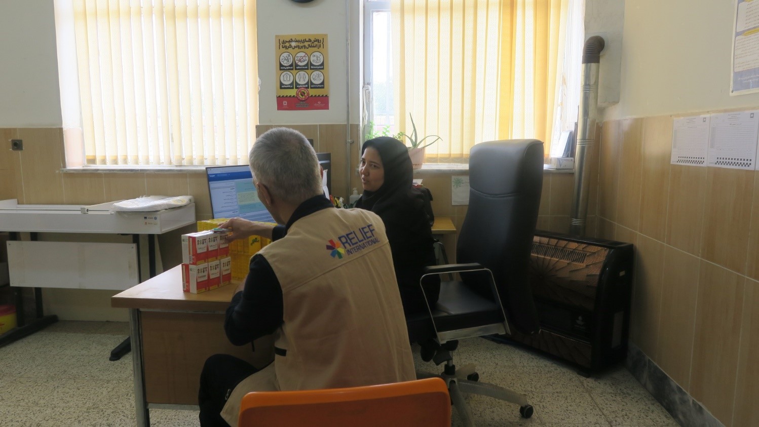 Dr Sanei, Relief International Iran Health and Nutrition Coordinator at the health clinic in Torbat-e-Jam , Khorasan Razavi Province, Iran