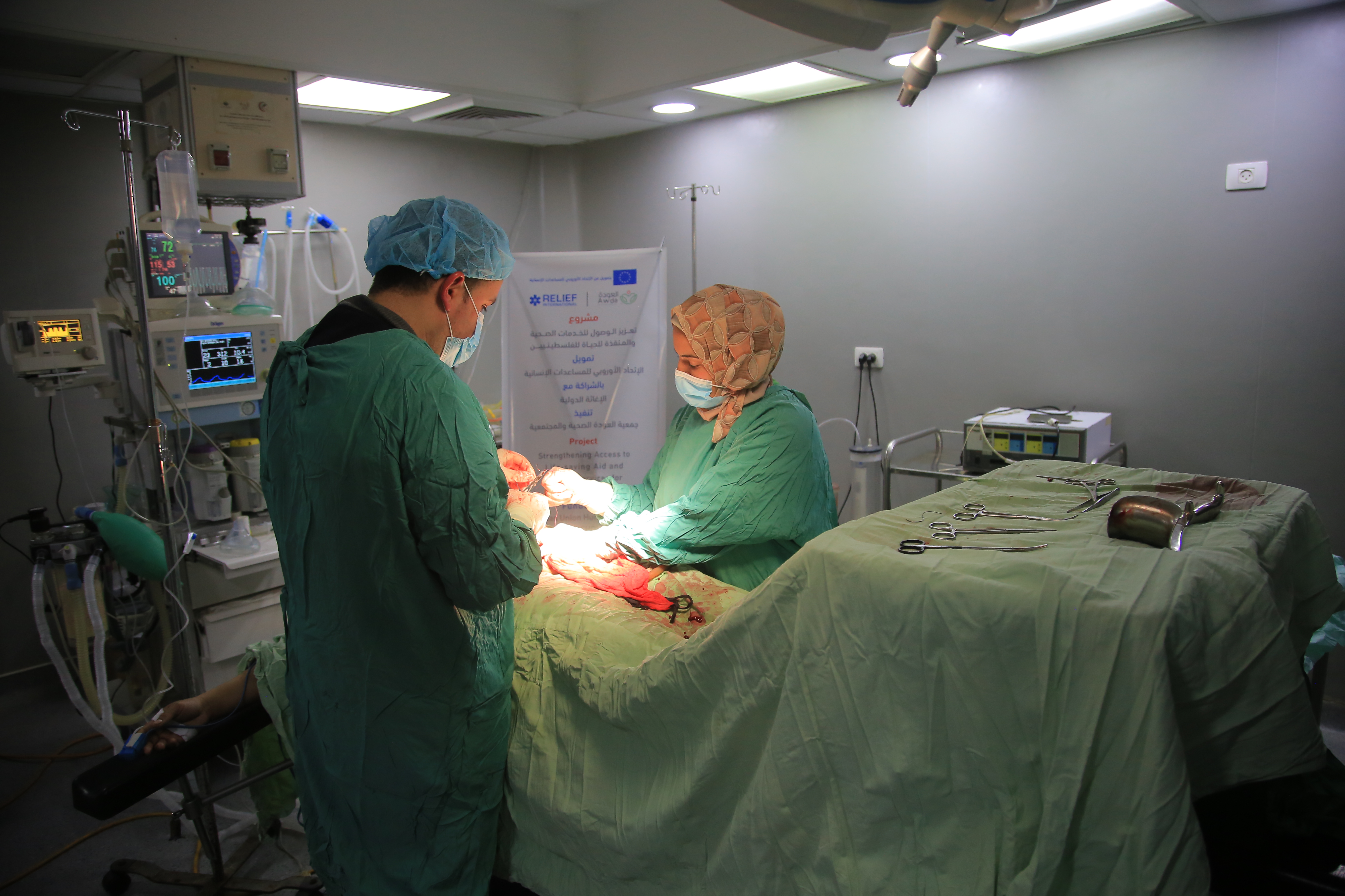 Surgery taking place at Al Awda Hospital in Jabalia